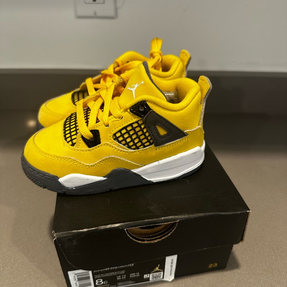 Kids Yellow Nike Jordan 4 lightning size 8c boys and girls Sneakers